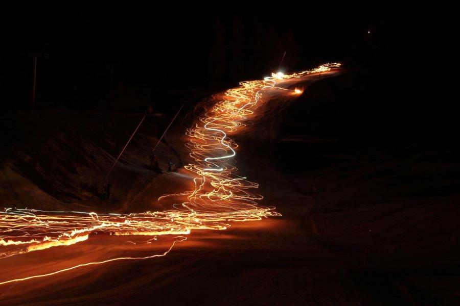 Torchlight Downhill Skiing