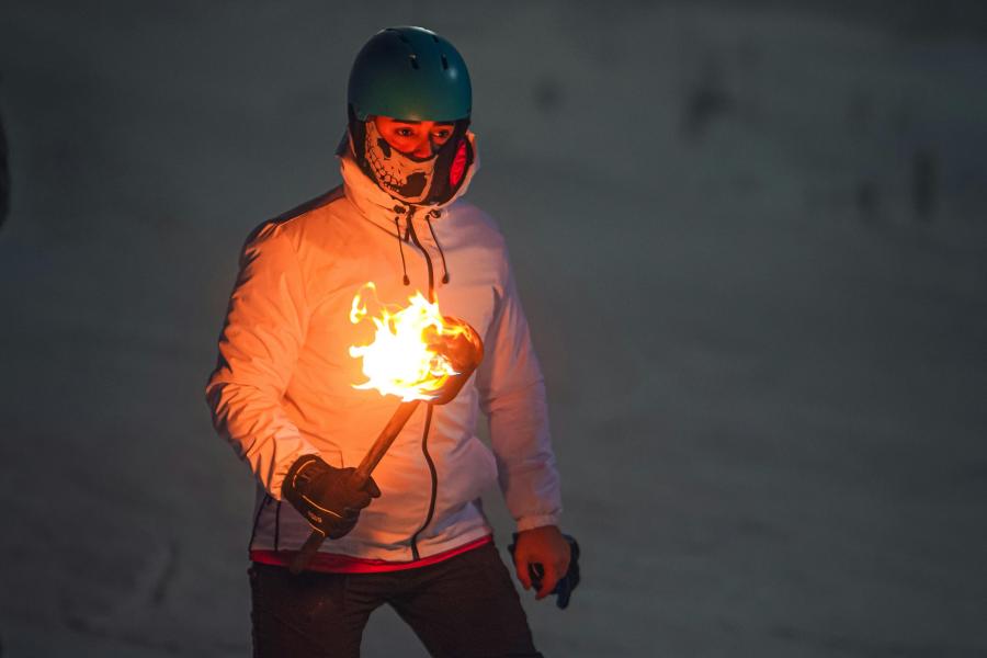 Discesa con fiaccola Discesa in notturna sulle piste di Antagnod